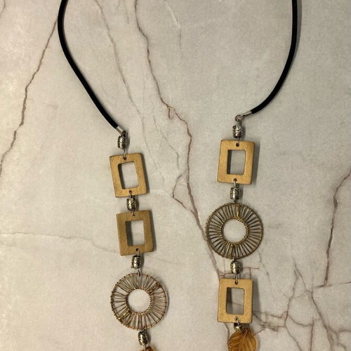Boho necklace with gold details and velvet black cord like new