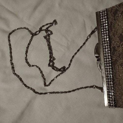 Evening handbag used with lace and rhinestones