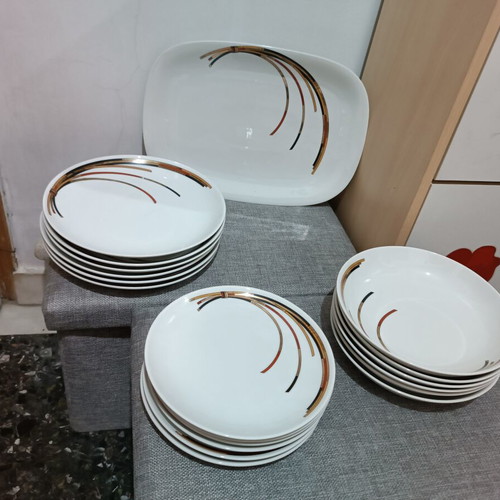 Porcelain dinnerware set with 6 dinner, 6 soup, 6 fruit plates and large serving platter