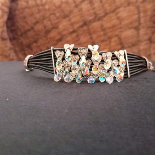 Leather women's bracelet with decorative hearts and rhinestones like new