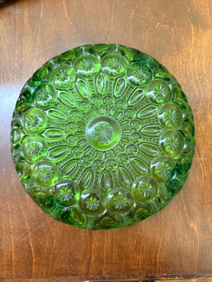 Green vintage glass plate used with embossed mid century design