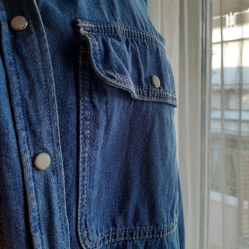 Women's denim shirt with long sleeves used
