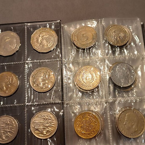 Album of 60 collectible coins
