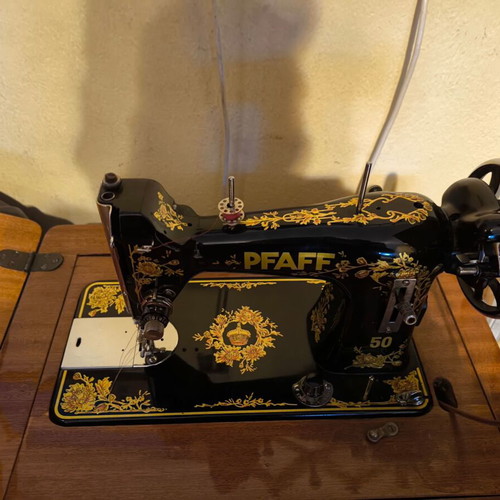 Singer PFAFF sewing machine used with cabinet