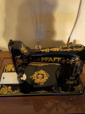 Singer PFAFF sewing machine used with cabinet