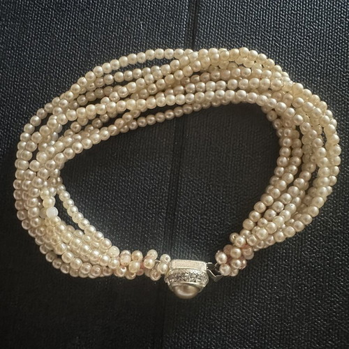 Vintage multi-strand pearl bracelet with cabochon clasp