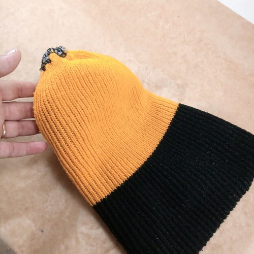Warm multicolor acrylic hat used