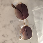 Sunglasses with brown lenses and gold frame, new with UV protection