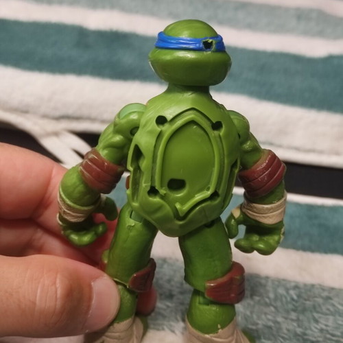 Leonardo Teenage Mutant Ninja Turtle figure used, missing shell