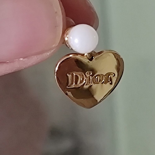 Christian Dior tribal gold heart drop earrings like new