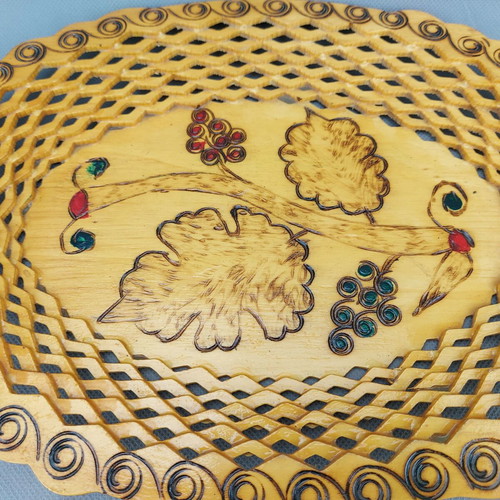 Old beautiful wooden fruit plate used