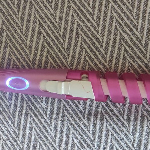 Portable hair curler like new