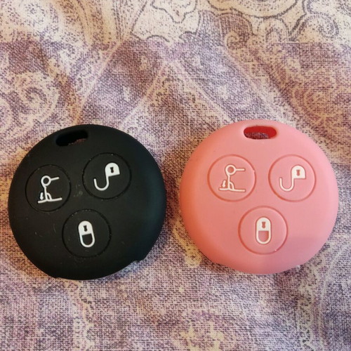 Smart for two silicone key covers like new, pink and black