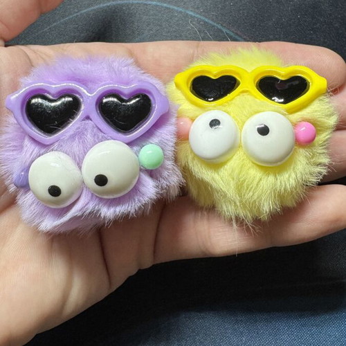 Charms for Crocs like new, pack of 2, purple and yellow furry faces