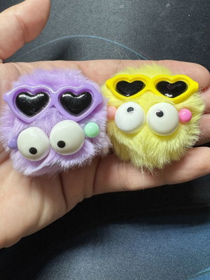 Charms for Crocs like new, pack of 2, purple and yellow furry faces