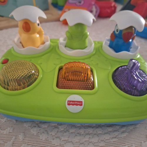 Fisher Price Pop Up Eggs toy with buttons used, no batteries
