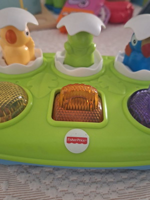 Fisher Price Pop Up Eggs toy with buttons used, no batteries