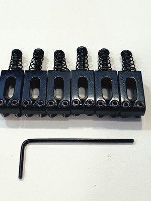 Set of 6 black modern style saddles for electric guitar bridge