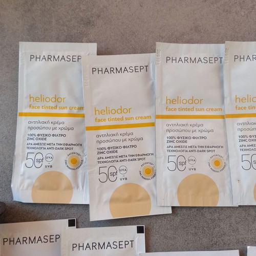 Makeup bag with new sunscreen samples CeraVe Pharmasept Heliocare