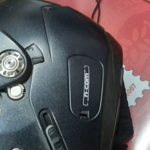 Nolan helmet used, flip-up with tinted visor and side communication