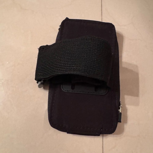 Phone armband case like new, black and orange