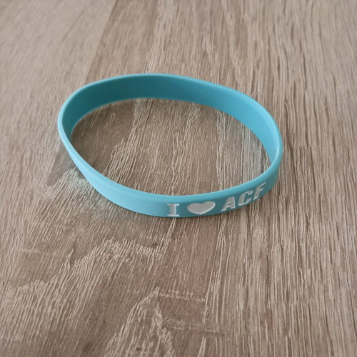 Athens Coffee Festival bracelet like new, turquoise rubber unisex