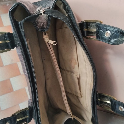 Vintage black women's shoulder bag with crocodile and snake texture, used