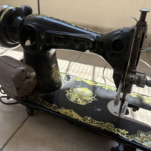 Vintage Eastern sewing machine used with gold Egyptian designs