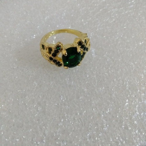 Ring with Oval Green Stone in Gold Color like new