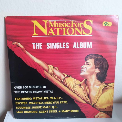 The Singles Album double vinyl used, heavy metal