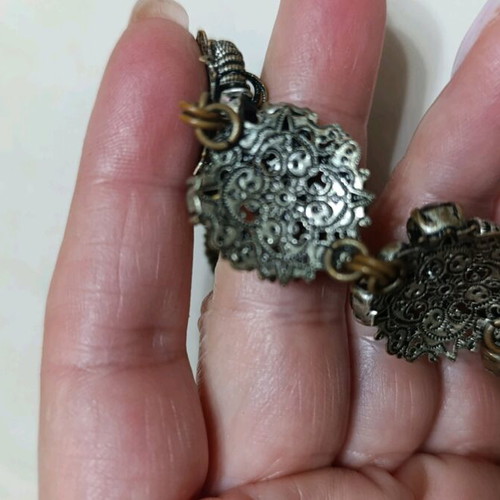Vintage bracelet used with purple stones and silver details