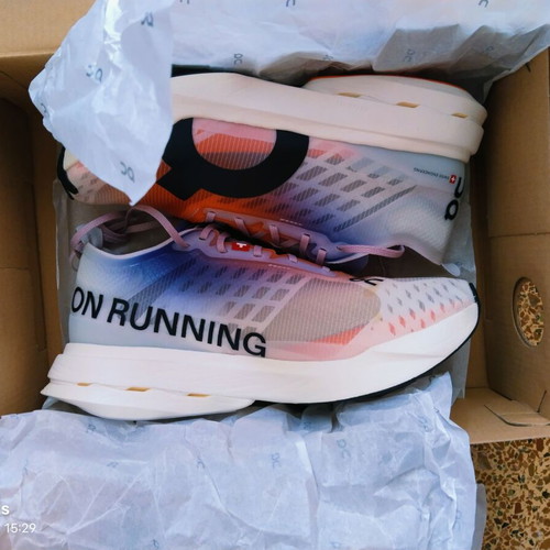 On Cloudboom Strike running shoes, white and red, size 39