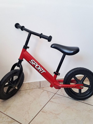 Balance bike for kids used, red with adjustable height