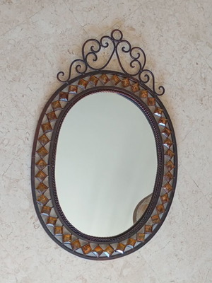 Decorative wall mirror like new with wrought iron frame
