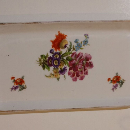 Porcelain tray used with flowers and golden accents