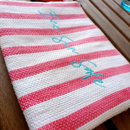 Summer toiletry bag used striped with embroidered Bee Sun Safe phrase