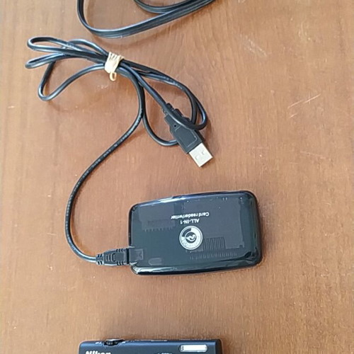 Nikon digital camera like new with card reader and triple audio-video cable
