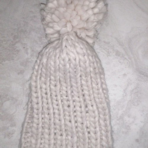 Winter hat new, beige, knitted with pompom
