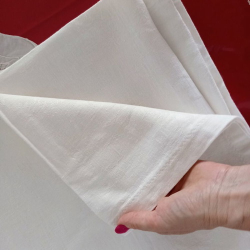 Handmade white jacquard tablecloth with embossed designs like new