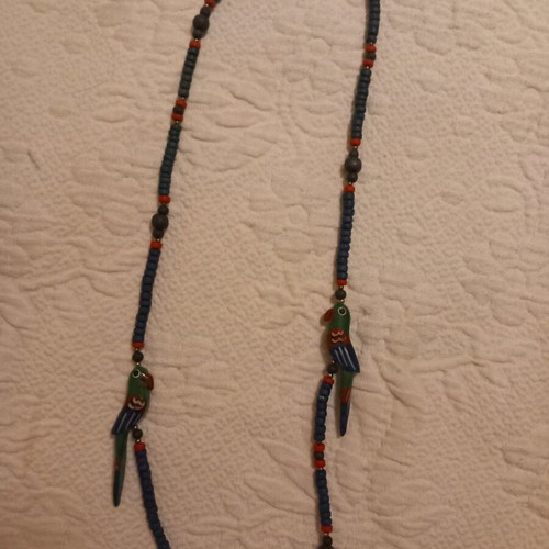 Wooden necklaces like new with beads and parrots, set of two