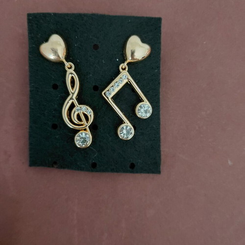 Gold-tone music note earrings with rhinestones and heart