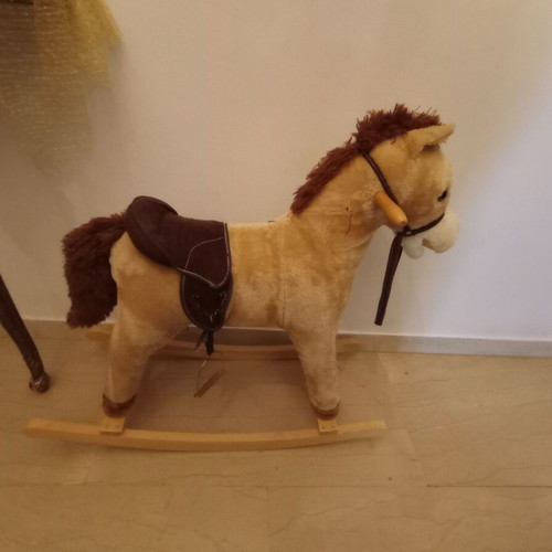 Plush brown rocking horse like new