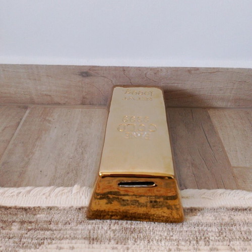 Gold-shaped piggy bank in excellent condition