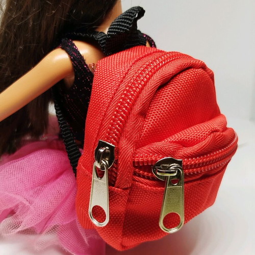 Doll backpack red in excellent condition with 2 compartments