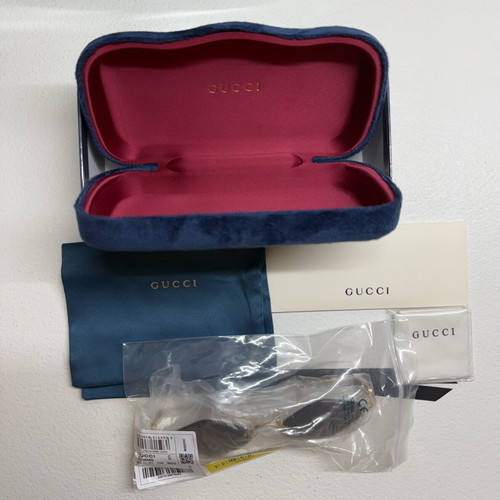 Gucci GG1604S 001 sunglasses, gold frame with black lenses