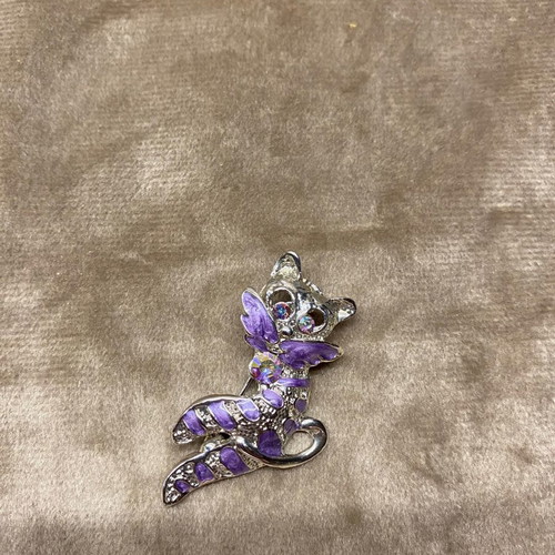 Brooch used, silver cat-shaped with purple stones