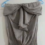 Strapless jumpsuit used, gray brown with bow and ruffles