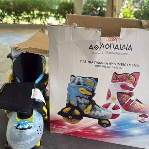 Athlopaidia adjustable 4-wheel skates like new