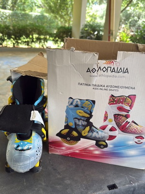 Athlopaidia adjustable 4-wheel skates like new