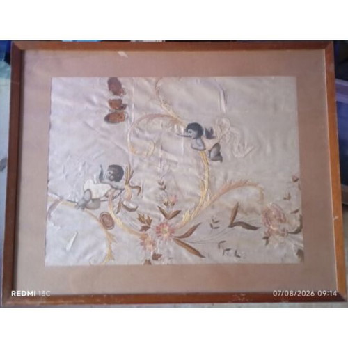 Embroidery with angels and flowers on silk or satin, used
